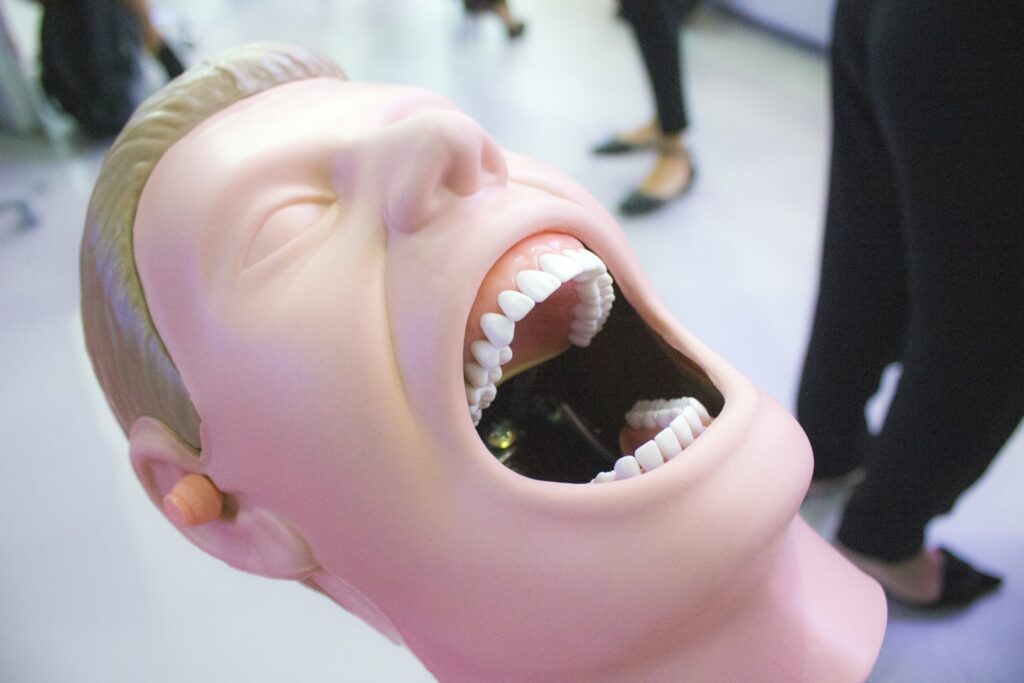 person showing teeth with tongue out
